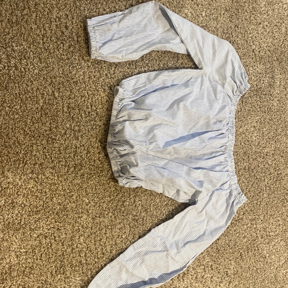 Off the should (blue and white stripe)